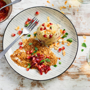Gebakken schol met granaatappelsaus en couscous
