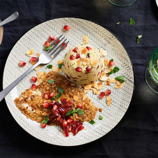 Gebakken schol met granaatappelsaus en couscous