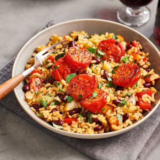 Paella met gebakken tomaten