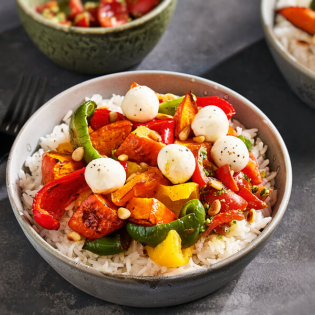 Geroosterde pompoen met mozzarella en pesto-tomaten