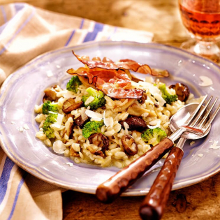 Paddenstoelenrisotto met broccoli en Parmaham