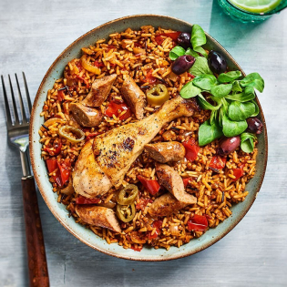 Pilav met drumsticks en merguez
